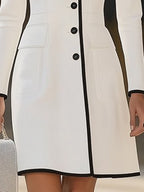 Chic Contrastée – Boutons Élégants & Coupe Structurée